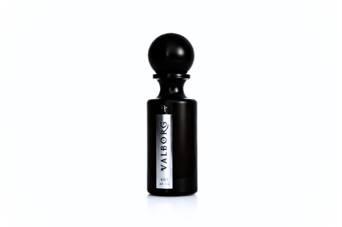 Perfume bottle, black glass with round cap and white VALBORG label, for Valborg – Floral & Smoky Perfume