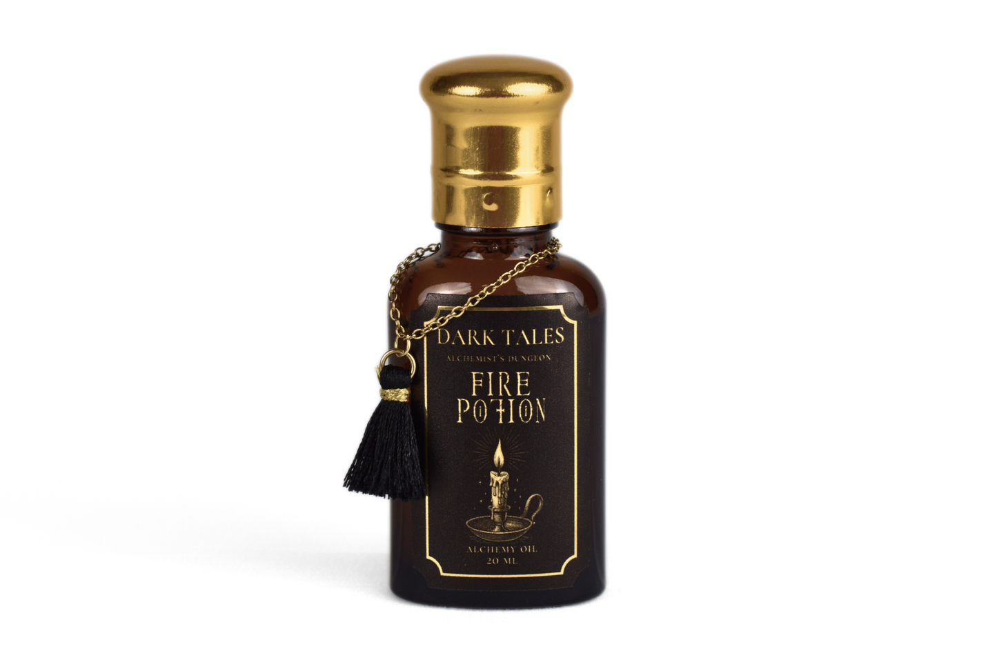 20ml Fire Potion natural scent oil bottle with drawstring bag and tassels, featuring sweet orange, clove, cinnamon, dark vanilla, pink pepper, cardamom, and orange blossom notes