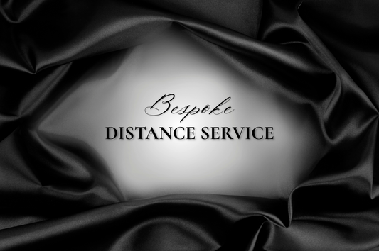 Bespoke Perfume distance service text in elegant black script and serif lettering on black satin fabric