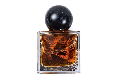 Black Pearl parfum in a clear square glass bottle with amber liquid, pirate ship artwork, and black spherical cap