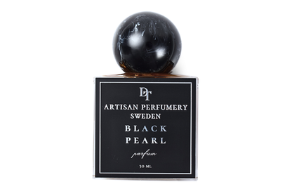 Black Pearl parfum bottle in black glass with a glossy spherical cap and minimalist white lettering