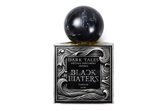 BLACK WATERS | PARFUM in a square glass bottle with black liquid, ornate monochrome label, and marbled black sphere cap