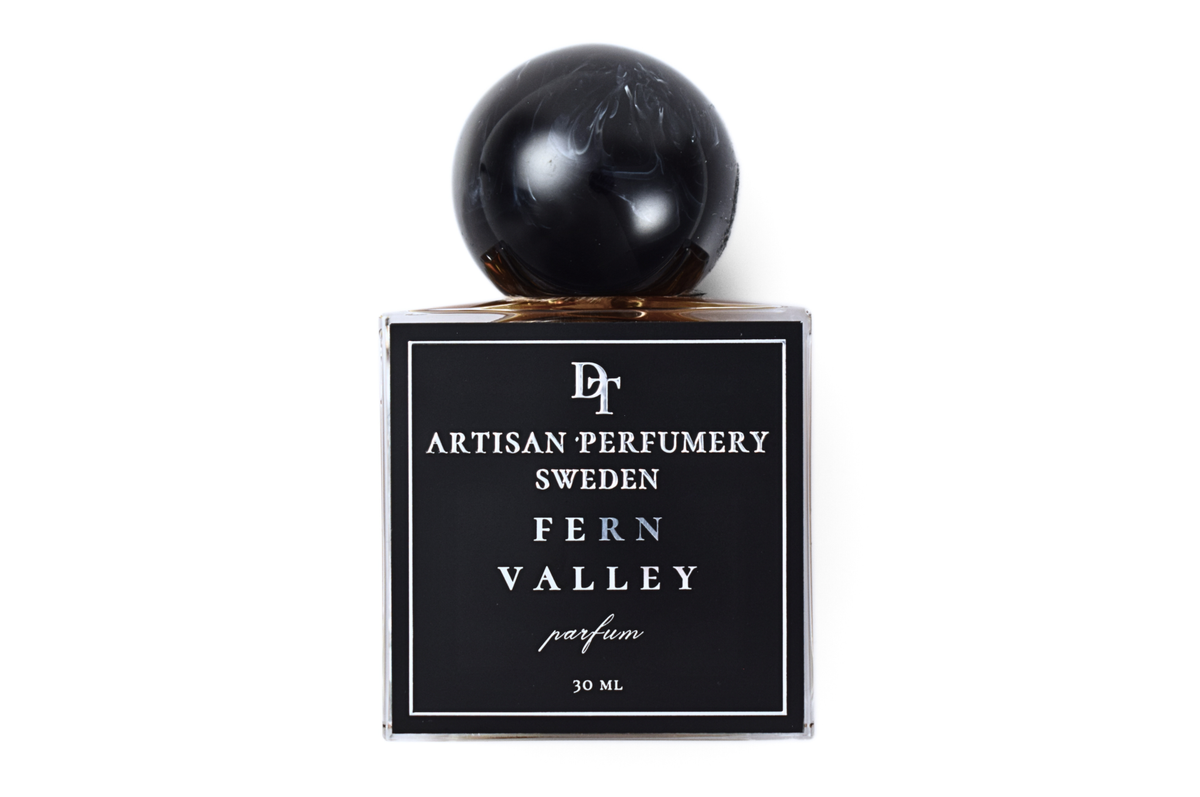 Fern Valley black 30 ml parfum bottle with clear glass edges and glossy spherical cap