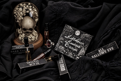 HALLOWEEN HAUNTED EDITION parfum samples in black boxes with gothic artwork and miniature spray bottles