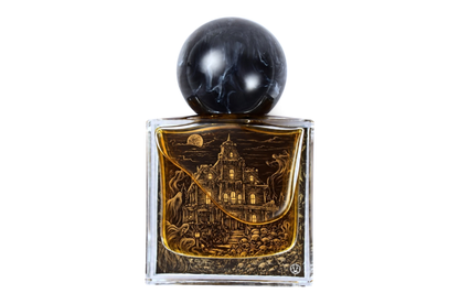 Haunted Mansion parfum in a clear square glass bottle with amber liquid, ornate haunted house illustration, and black marbled sphere cap