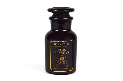 Incense Blend in a dark brown glass apothecary bottle with a black stopper and ornate gold floral label