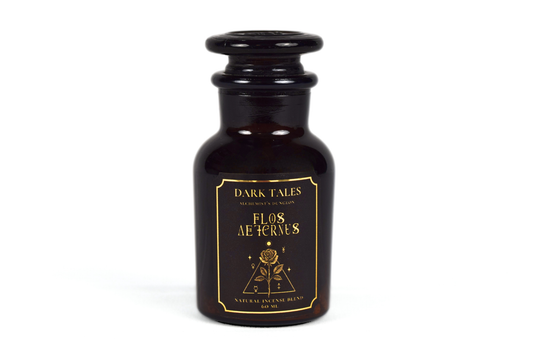 Incense Blend in a dark brown glass apothecary bottle with a black stopper and ornate gold floral label