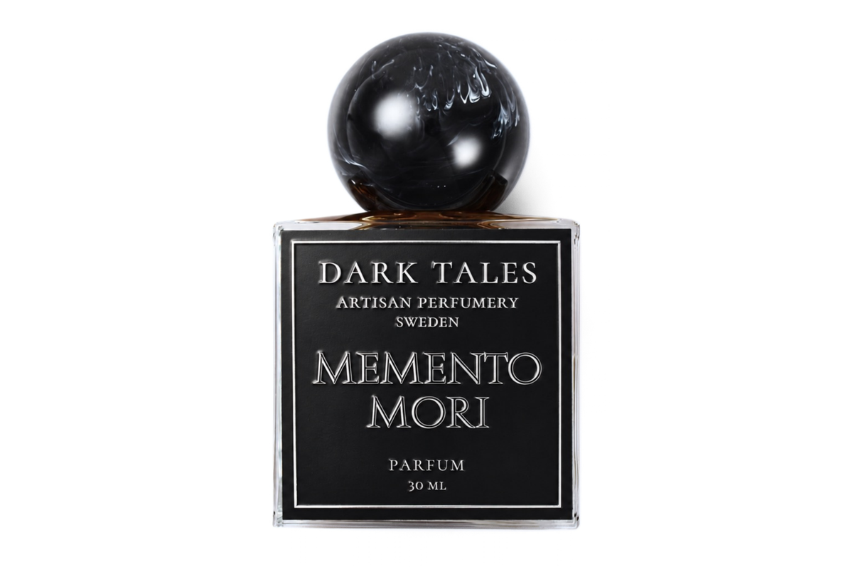 MEMENTO MORI parfum bottle with black label, clear glass, and glossy black spherical cap, 30 ml