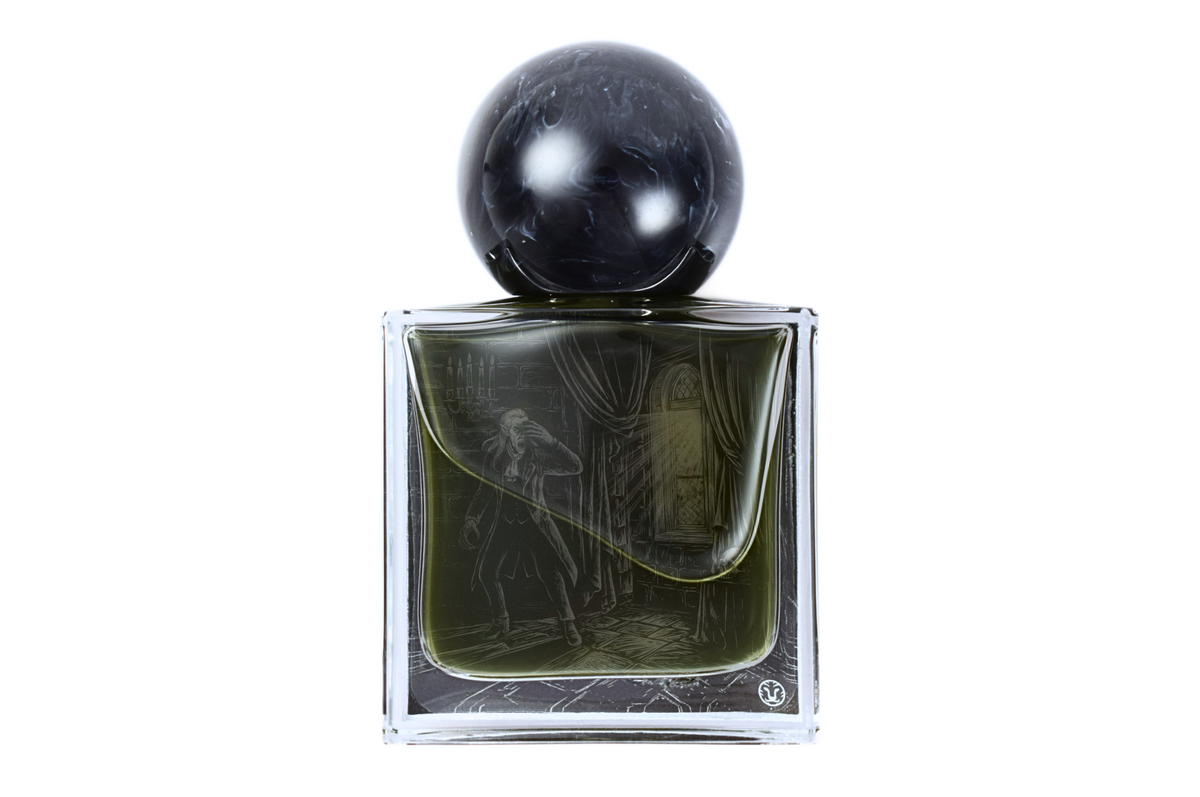 NSFRTÅ parfum in a clear square glass bottle with dark liquid, etched illustration, and black marbled spherical cap