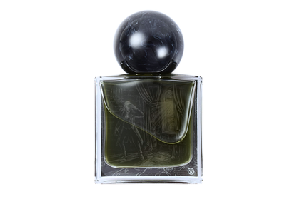 NSFRTÅ parfum in a clear square glass bottle with dark liquid, etched illustration, and black marbled spherical cap