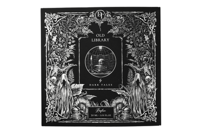 Old Library black parfum box with ornate white gothic botanical artwork, skulls, ghost figures, and 30 ml label