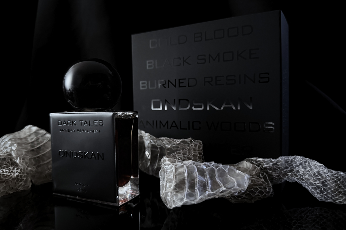 Ondskan parfum in a black rectangular bottle with glossy round cap and dark smoky packaging