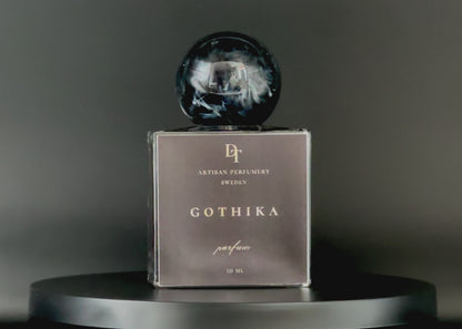 Gothika Parfum bottle with gothic cathedral-inspired design.
