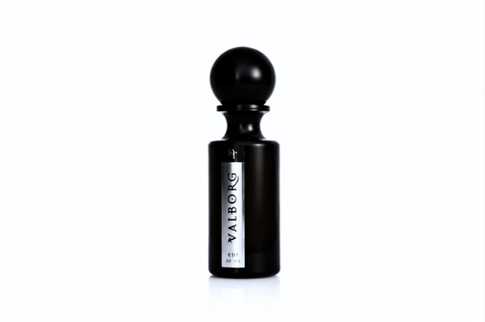 Perfume bottle, black glass with round cap and white VALBORG label, for Valborg – Floral & Smoky Perfume